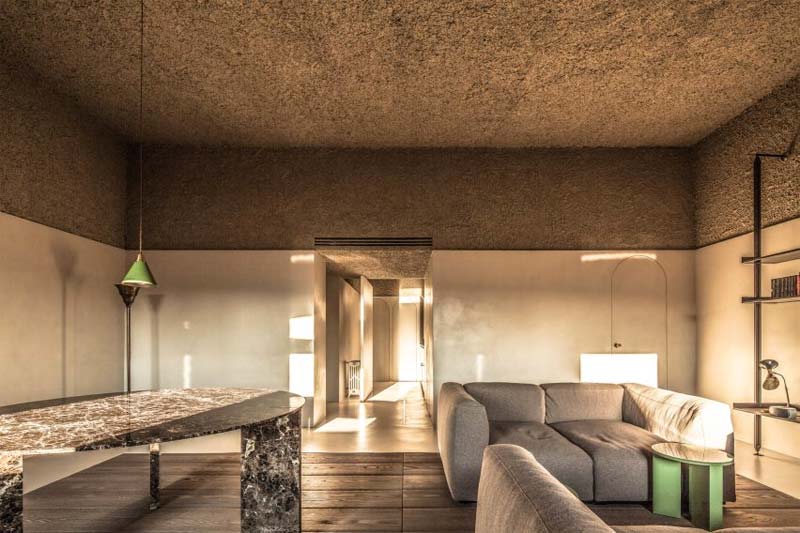 betonstuc muren woonkamer grove plafonds