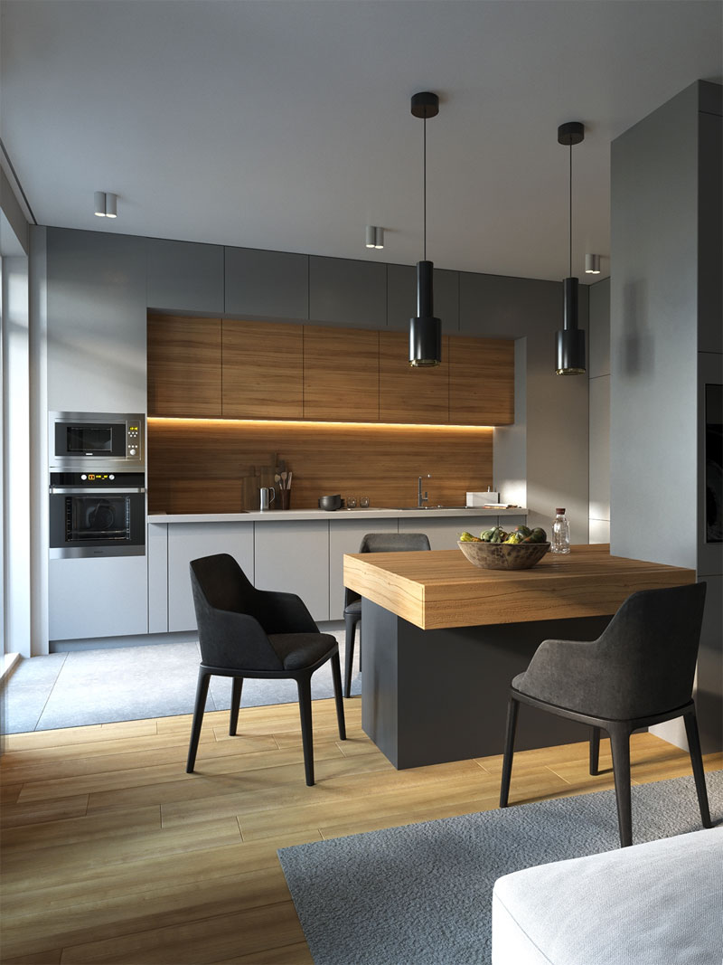 De houten keuken achterwand voegt heel veel sfeer en warmte toe aan deze moderne grijze keuken. De houten keuken achterwand voegt heel veel sfeer en warmte toe aan deze moderne grijze keuken.