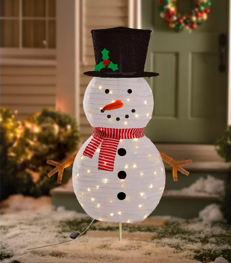 leuke sneeuwpop decoratie voortuin