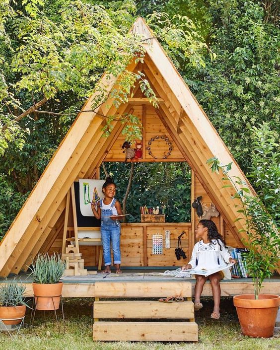 Speelhuisje in de tuin Speelhuisje in de tuin