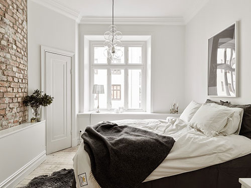 Stijlvolle minimalistisch witte slaapkamer