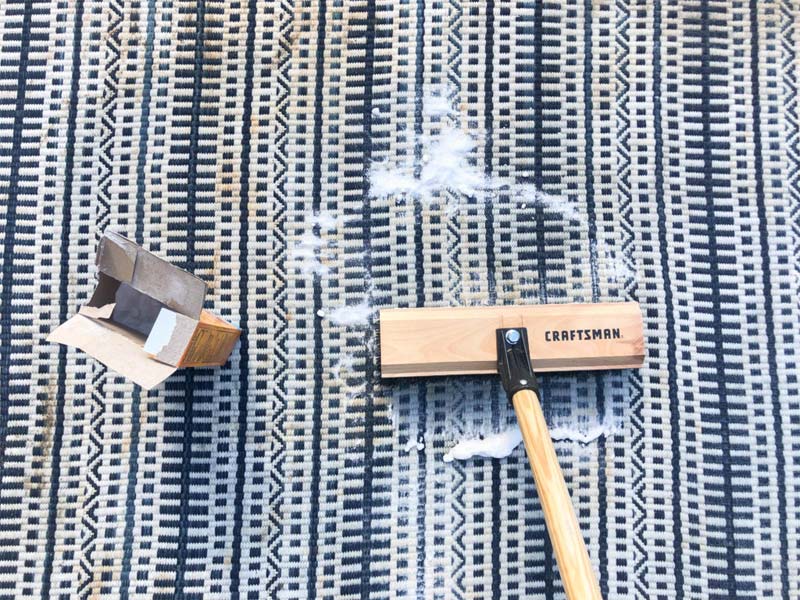 Vloerkleed schoonmaken