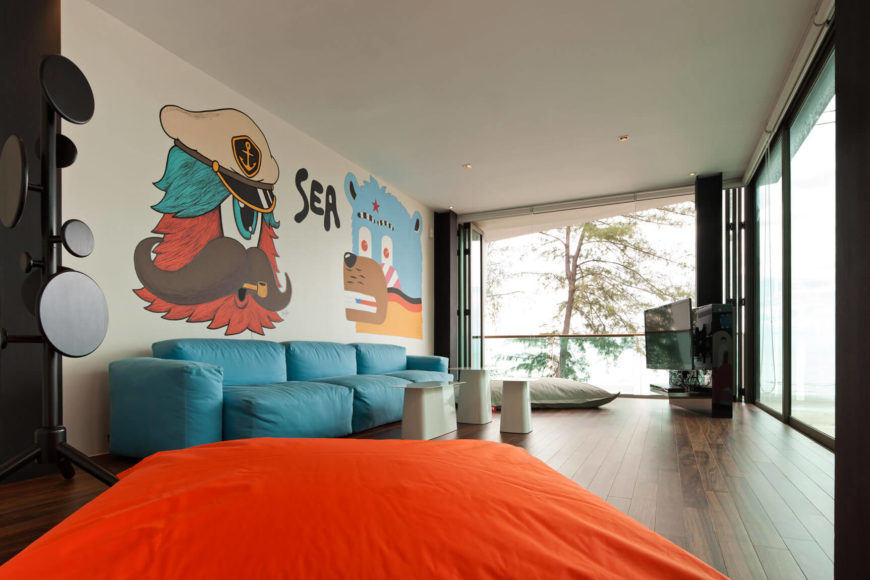woonkamer harmonicadeuren balkon muurschildering