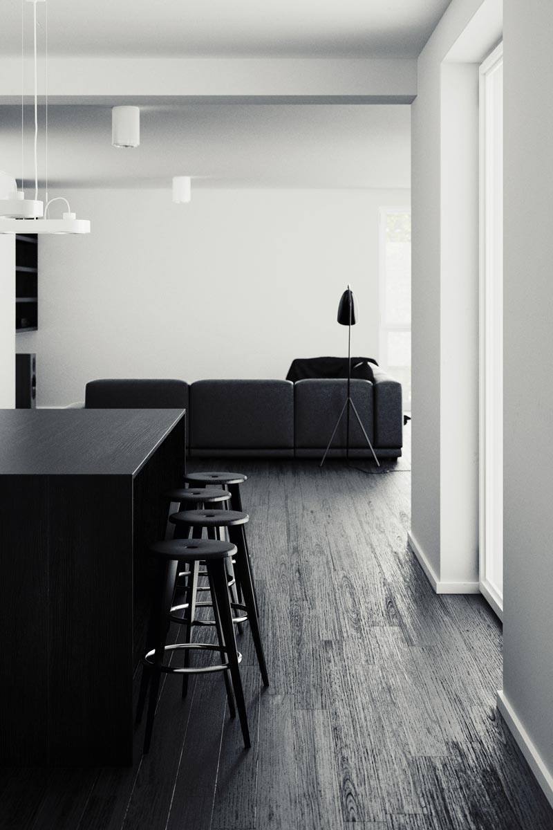 Dit stijlvolle interieur, kenmerkt zich met een prachtige zwarte houten vloer, waarvan de houtnerven mooi zichtbaar zijn. Rzemioslo Architektoniczne combineerde strakke witte muren en een wit plafond met een zwarte houten vloer, een zwarte keuken, en zwarte meubels.